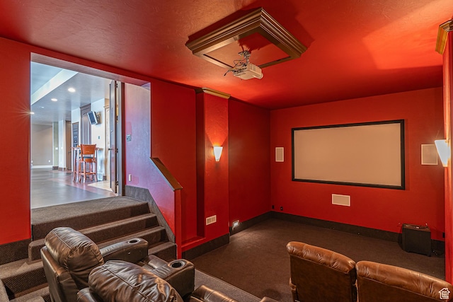 home theater room with baseboards