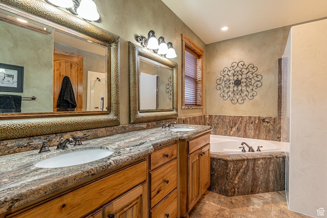 full bathroom with a sink, double vanity, a garden tub, and tile patterned flooring