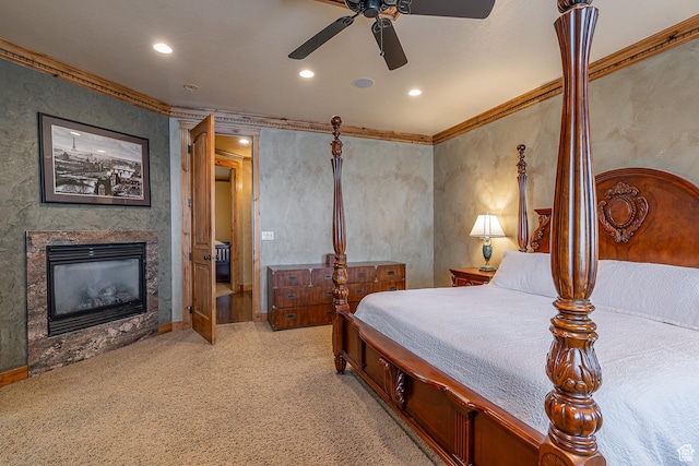 bedroom with crown molding, light carpet, a fireplace, and recessed lighting