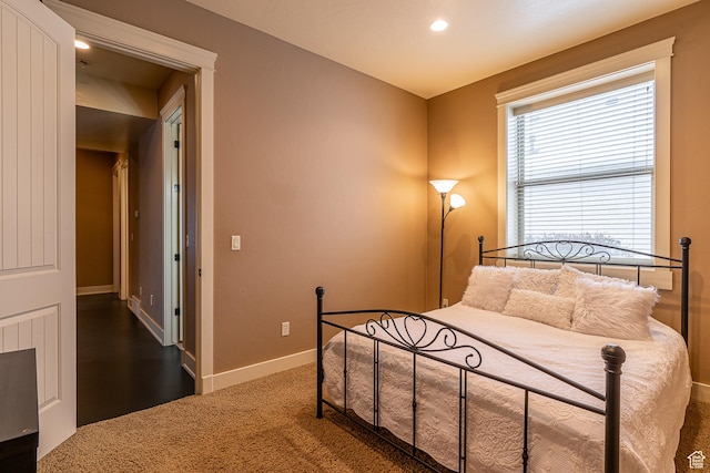 bedroom featuring baseboards, recessed lighting, and carpet floors