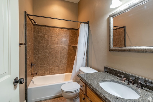 bathroom featuring vanity, toilet, and shower / bath combo