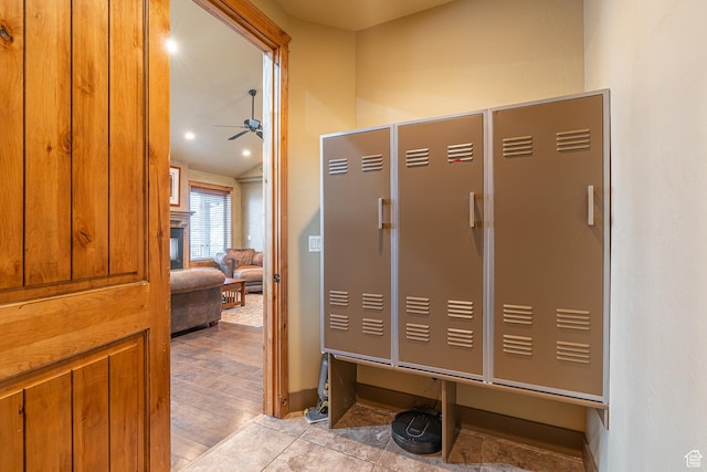mudroom with lofted ceiling and ceiling fan