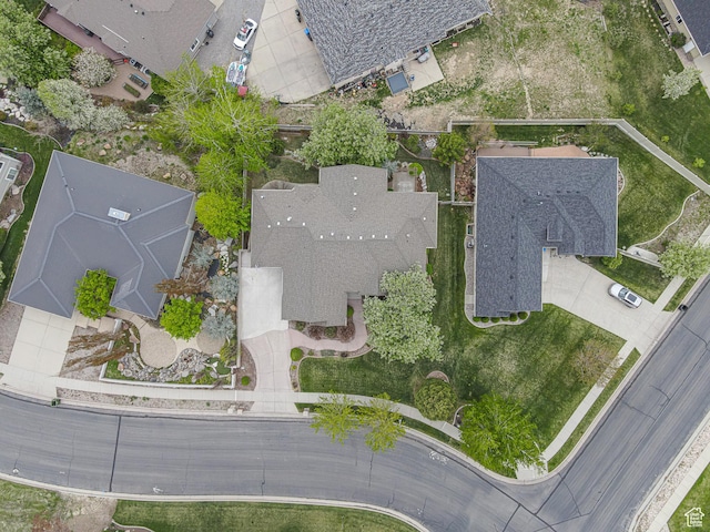 birds eye view of property with a residential view