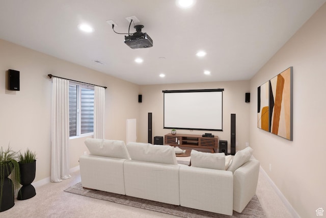 home theater with baseboards, light carpet, visible vents, and recessed lighting