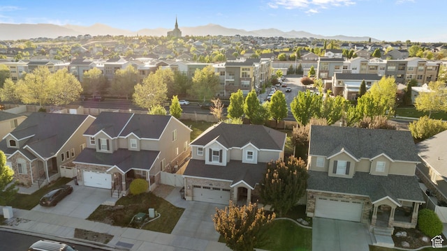 aerial view with a mountain view and a residential view