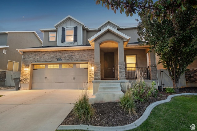 view of front of home featuring concrete driveway, stone siding, a porch, and stucco siding