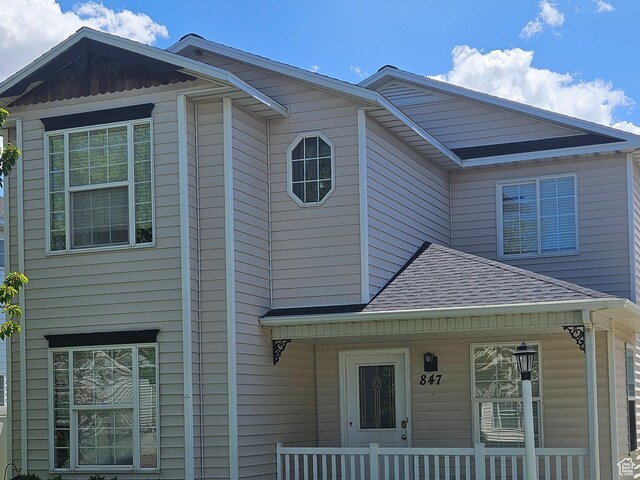 847 W 250 N, Spanish Fork, UT 84660 - view of front of home with roof with shingles and covered porch