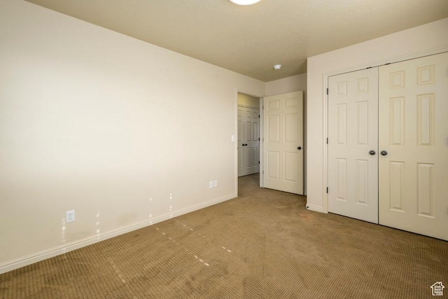 474 S 2550 W Unit 2, Springville, UT 84663 - unfurnished bedroom with light colored carpet, a closet, and baseboards