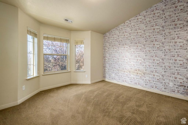 474 S 2550 W Unit 2, Springville, UT 84663 - carpeted spare room featuring vaulted ceiling, visible vents, baseboards, and a healthy amount of sunlight