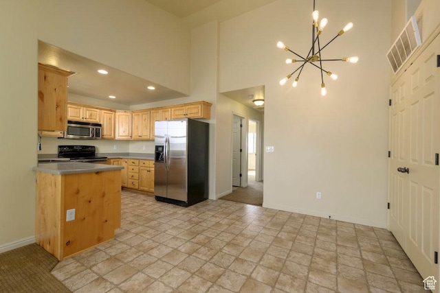 474 S 2550 W Unit 2, Springville, UT 84663 - kitchen featuring light brown cabinetry, visible vents, baseboards, appliances with stainless steel finishes, and a chandelier