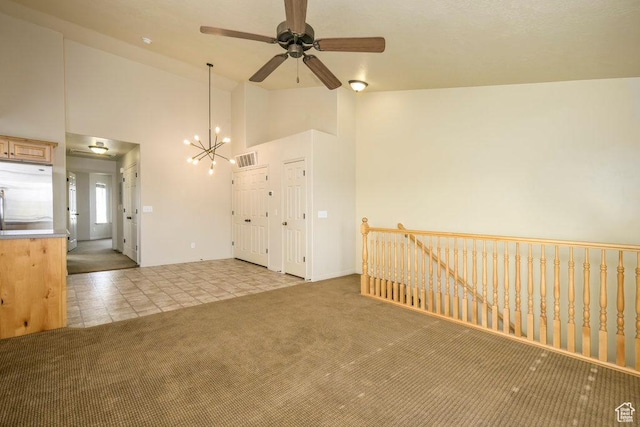 474 S 2550 W Unit 2, Springville, UT 84663 - carpeted spare room with baseboards, ceiling fan with notable chandelier, high vaulted ceiling, and visible vents
