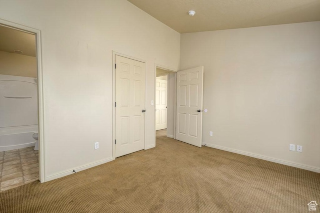 474 S 2550 W Unit 2, Springville, UT 84663 - unfurnished bedroom featuring lofted ceiling, carpet flooring, and baseboards