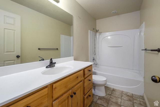 474 S 2550 W Unit 2, Springville, UT 84663 - full bath with toilet, baseboards, stone finish flooring, vanity, and tub / shower combination