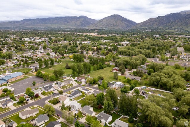 736 Majestic Dr, Logan, UT 84321 - aerial overview of property's location with mountains and nearby suburban area