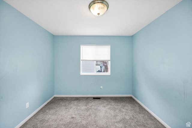 736 Majestic Dr, Logan, UT 84321 - empty room featuring carpet floors and baseboards