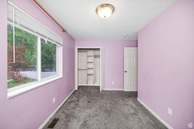 736 Majestic Dr, Logan, UT 84321 - unfurnished bedroom featuring carpet, baseboards, and a closet