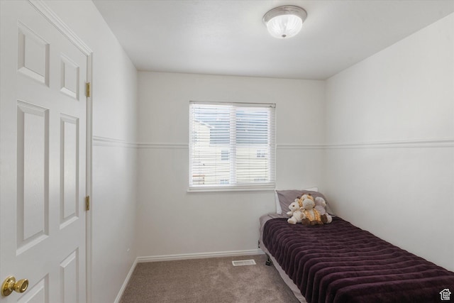 251 Sunstone Cir, Logan, UT 84321 - carpeted bedroom featuring baseboards and visible vents