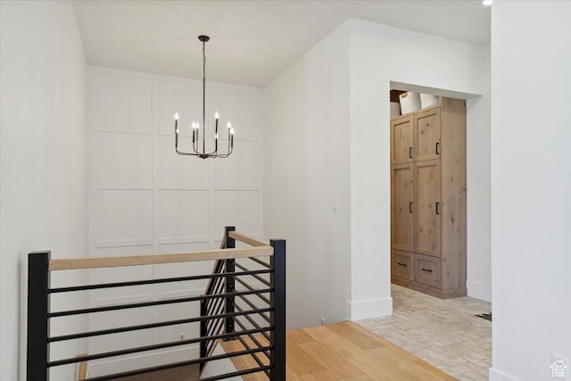 dining area featuring an inviting chandelier and baseboards