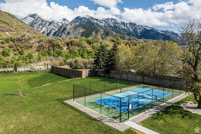9293 S Regatta Ln, Cottonwood Heights, UT 84093 - view of pool with a yard, fence, a mountain view, and a tennis court