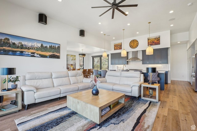 11332 N White Tail Ct Unit 30, Hideout, UT 84036 - living room with light wood-style floors, baseboards, ceiling fan, and recessed lighting