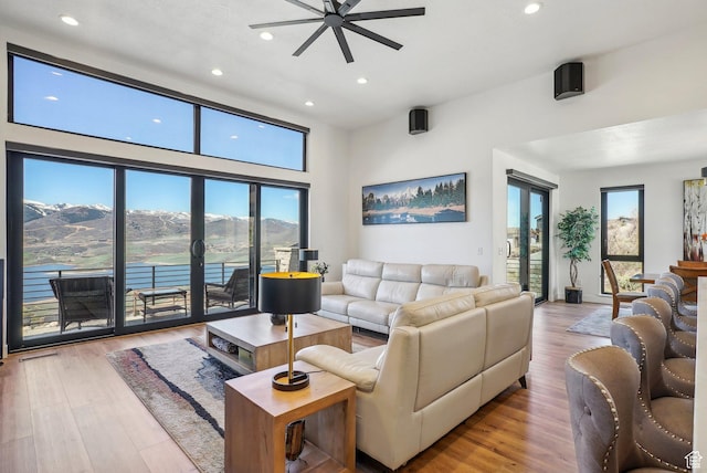 11332 N White Tail Ct Unit 30, Hideout, UT 84036 - living room featuring a ceiling fan, a healthy amount of sunlight, and recessed lighting