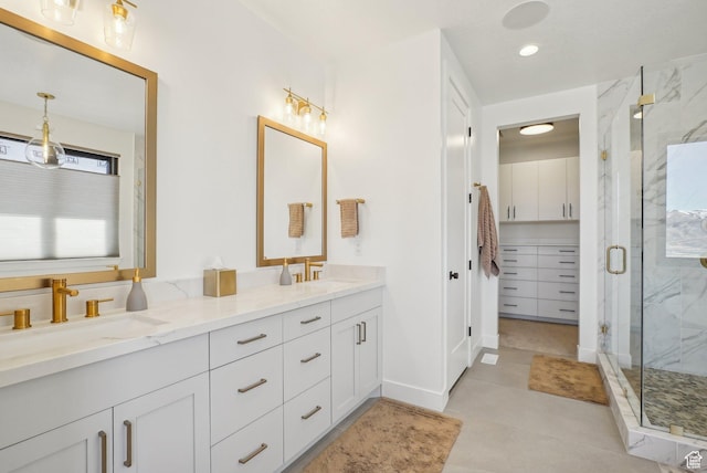 11332 N White Tail Ct Unit 30, Hideout, UT 84036 - bathroom featuring a marble finish shower, double vanity, and a sink