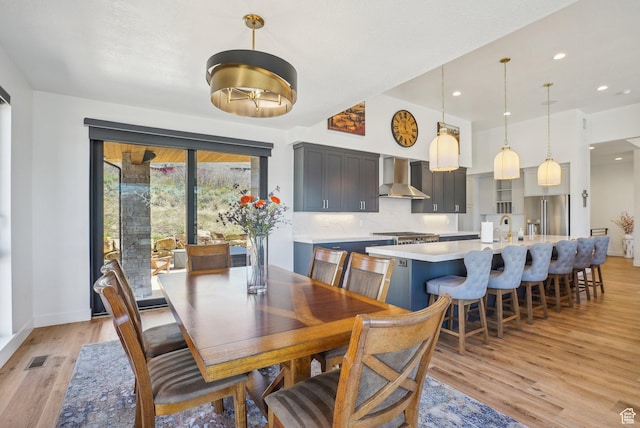 11332 N White Tail Ct Unit 30, Hideout, UT 84036 - dining space with light wood-type flooring, visible vents, baseboards, and recessed lighting