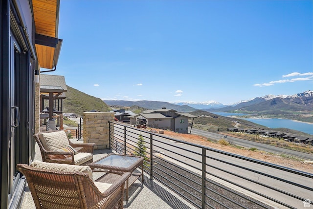 11332 N White Tail Ct Unit 30, Hideout, UT 84036 - balcony featuring a water and mountain view