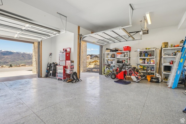 11332 N White Tail Ct Unit 30, Hideout, UT 84036 - garage with a mountain view and a garage door opener