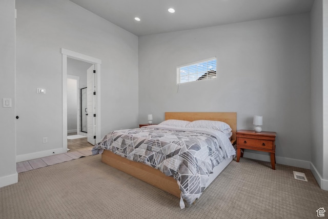 bedroom featuring carpet flooring, baseboards, visible vents, and recessed lighting