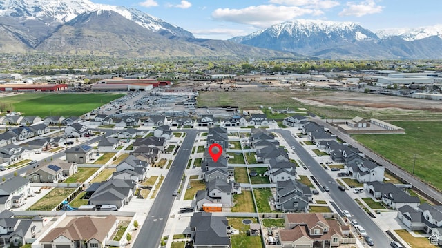 birds eye view of property featuring a residential view and a mountain view