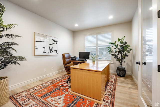 office area with light wood-style floors, baseboards, recessed lighting, and french doors