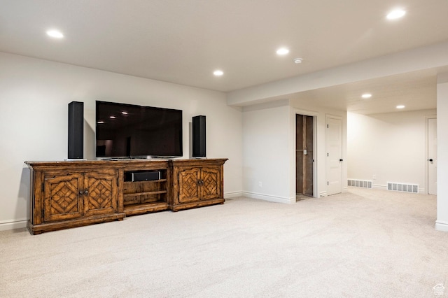 unfurnished living room featuring carpet floors, recessed lighting, and baseboards