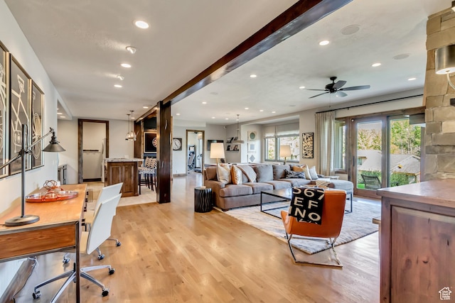 living area with a ceiling fan, light wood-style floors, and recessed lighting