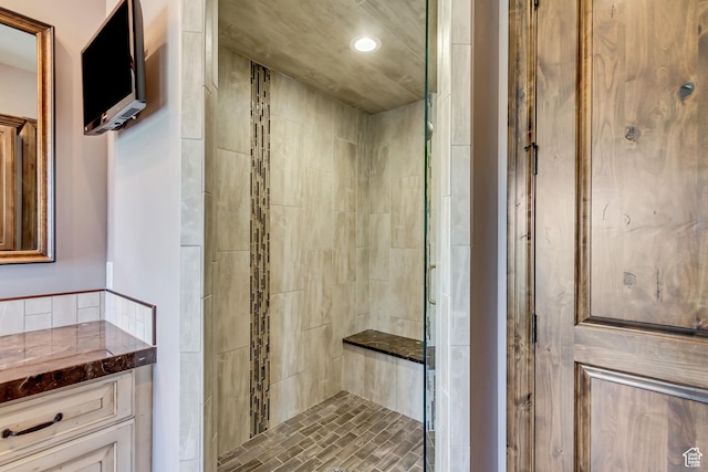 full bathroom featuring a stall shower and recessed lighting