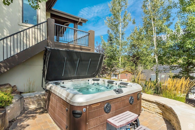 view of patio with a hot tub