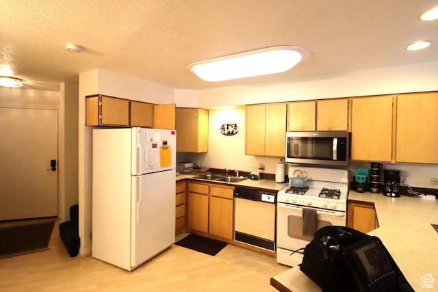89 E Steam Engine Dr # 6B, Brian Head, UT 84719 - kitchen featuring a sink, a textured ceiling, white appliances, light countertops, and recessed lighting