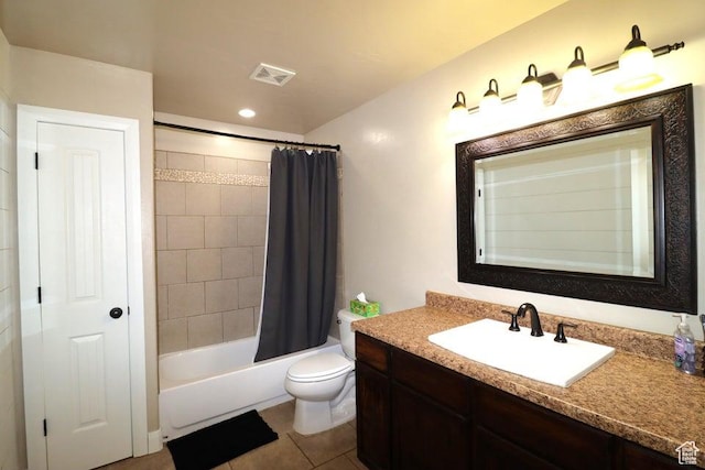 bathroom featuring toilet, visible vents, shower / bath combination with curtain, tile patterned flooring, and vanity