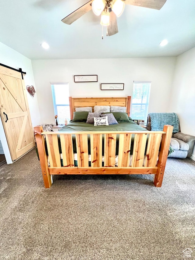 954 N 280 E, Elsinore, UT 84724 - bedroom featuring recessed lighting, carpet flooring, a barn door, and multiple windows