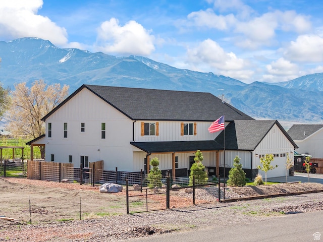 954 N 280 E, Elsinore, UT 84724 - view of front of home with roof with shingles, a garage, a mountain view, and driveway