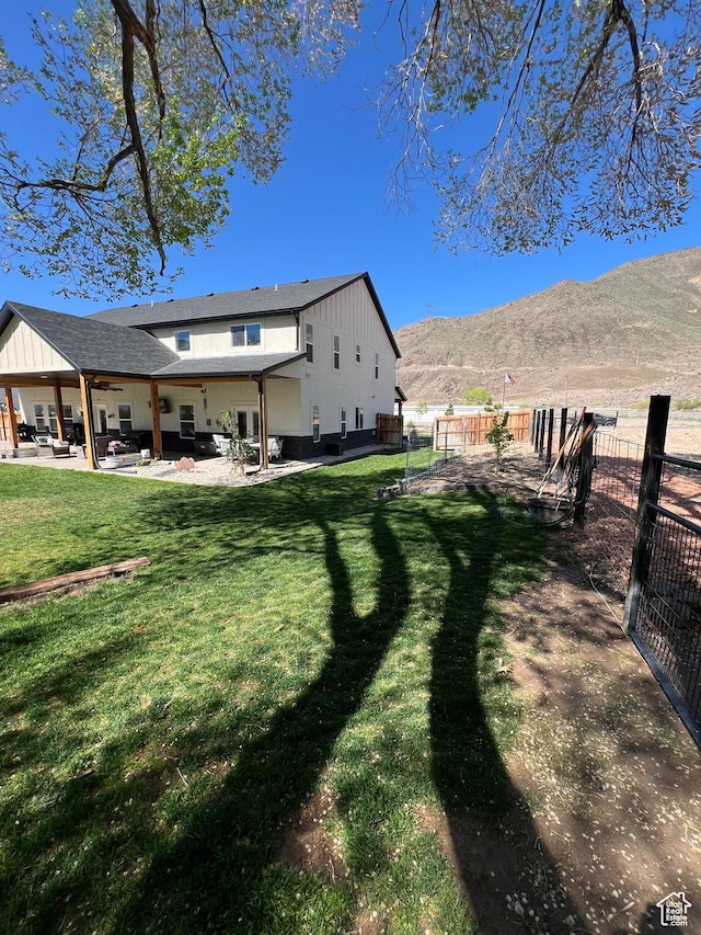 954 N 280 E, Elsinore, UT 84724 - back of property with a yard, ceiling fan, fence, and a patio area
