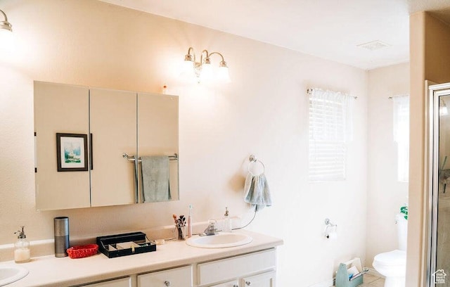 1478 S 4200 W, Cedar City, UT 84720 - bathroom with toilet, a shower with door, double vanity, and a sink