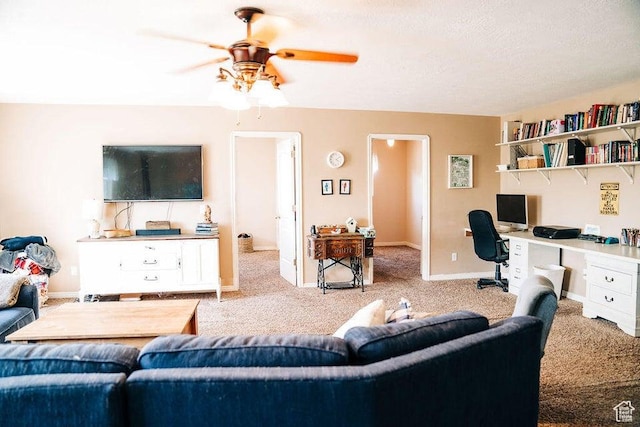 1478 S 4200 W, Cedar City, UT 84720 - living area featuring a ceiling fan, carpet flooring, built in desk, and a textured ceiling