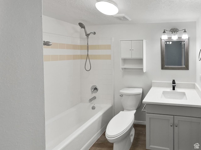 1303 N Riverside Ave Unit 32, Provo, UT 84604 - bathroom with toilet, wood finished floors, vanity, a textured ceiling, and visible vents