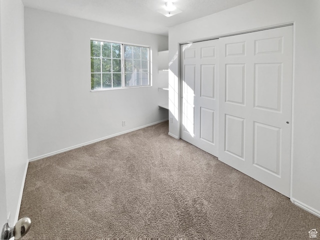 1303 N Riverside Ave Unit 32, Provo, UT 84604 - unfurnished bedroom with carpet floors, a closet, and baseboards