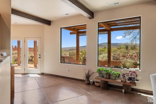 1151 W Shawnee Ct, Ivins, UT 84738 - doorway featuring a wealth of natural light, beam ceiling, and visible vents