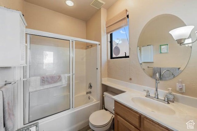 1151 W Shawnee Ct, Ivins, UT 84738 - full bath with toilet, combined bath / shower with glass door, vanity, and visible vents