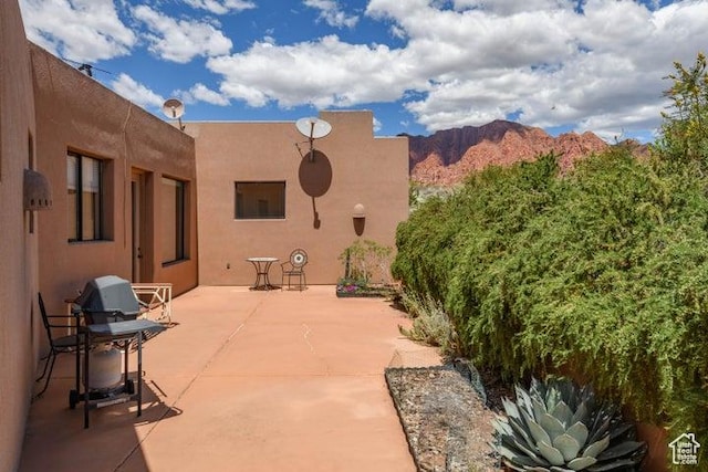 1151 W Shawnee Ct, Ivins, UT 84738 - view of patio featuring a mountain view