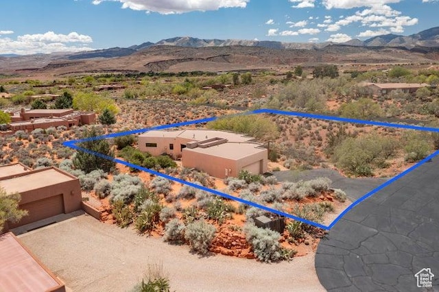 1151 W Shawnee Ct, Ivins, UT 84738 - birds eye view of property with a mountain view and a desert view
