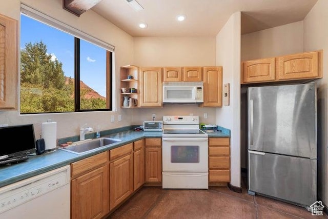 1151 W Shawnee Ct, Ivins, UT 84738 - kitchen with light brown cabinetry, a sink, visible vents, white appliances, and recessed lighting